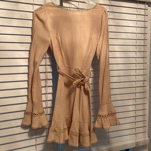 Saints + Secrets tan boho dress with bell sleeves and tie front.